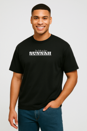 Smiling man wearing black oversized t-shirt with “The Path of Love – Sunnah” printed on chest, modest Islamic streetwear by VedFra