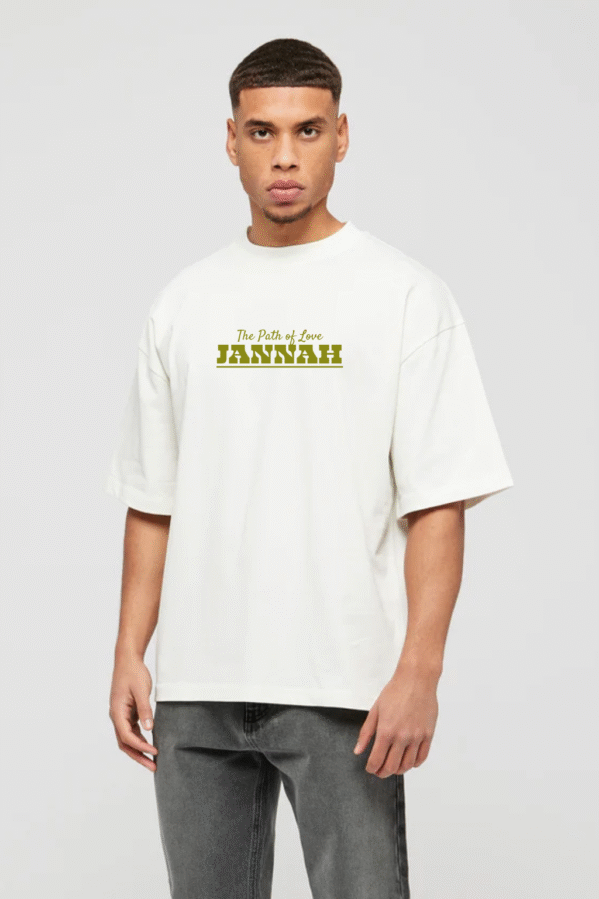 Man wearing white oversized T-shirt with “The Ultimate Goal – Jannah” graphic, modest faith wear from VedFra