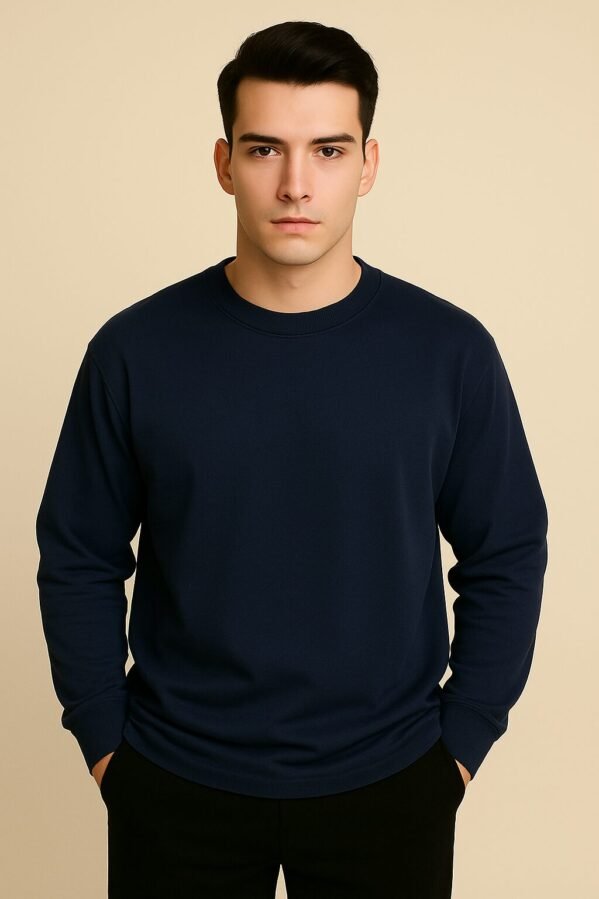 Navy blue oversized full sleeve tee with clean lines and confident posture, model facing forward.
