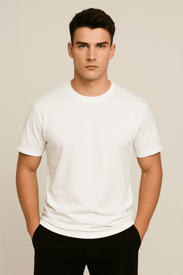 Model wearing VedFra Pearl White Tee – premium regular fit cotton t-shirt in clean minimal white for everyday wear.”