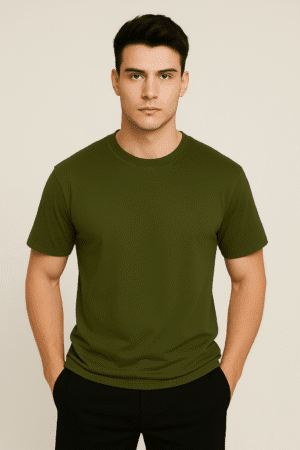 Young man wearing an oversized olive green half sleeve t-shirt with minimal design, styled against a beige studio background.